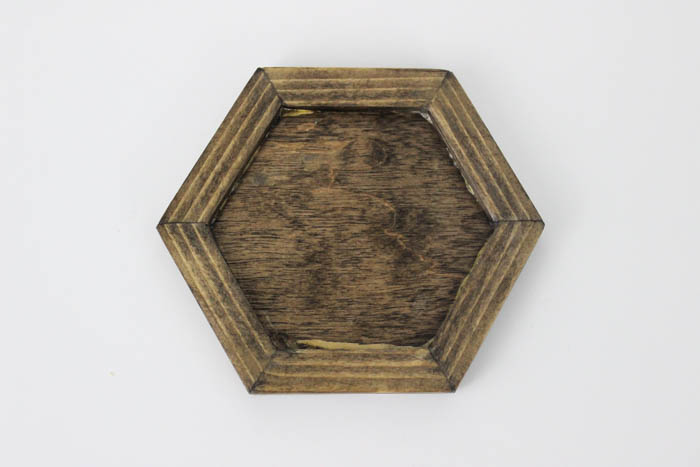A simple wooden frame for your own modern hexagon coasters