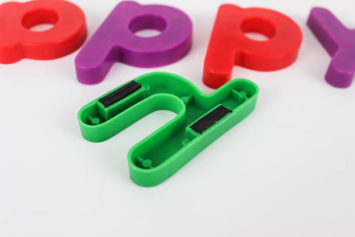Easy and creative DIY chocolate letters! Make your own molds from fridge magnets, and form chocolate letters in just a few minutes! Perfect for spelling out names, dates, etc for birthdays, weddings, anniversary parties, engagement parties, and more! 