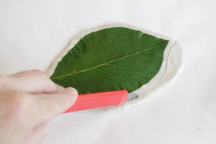 DIY Leaf Imprint Clay Bowls- cut off excess clay around leaf