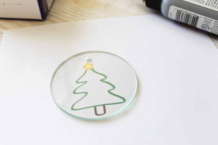 These faux stained glass Christmas ornaments are perfect for your tree! Including a free template to trace!