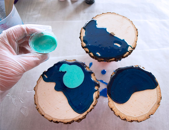 Pouring resin onto wood coasters