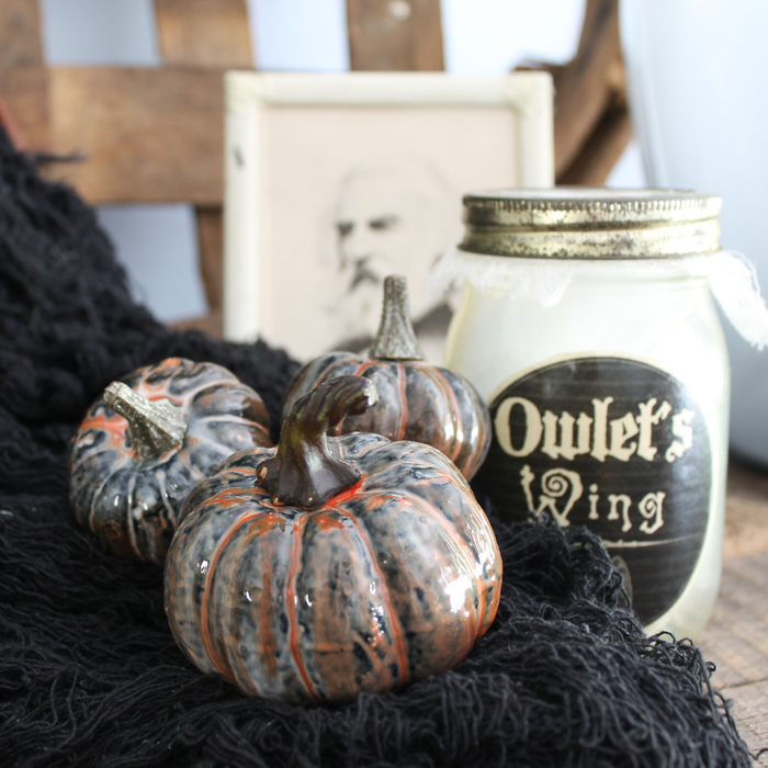 These marbled resin pumpkins are easy to make and perfect for your Halloween and fall decor!