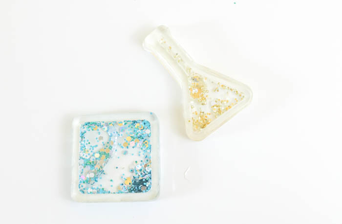 fillable resin charms on a white background