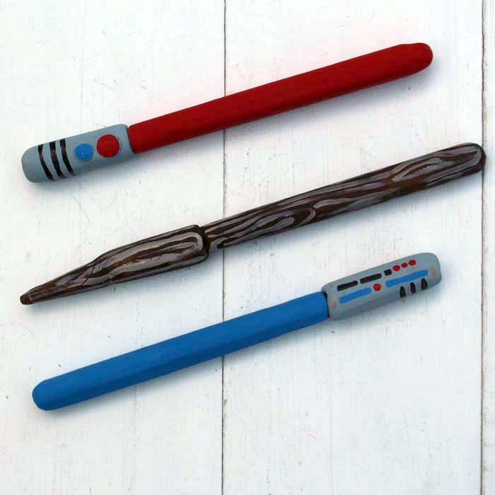 Custom Pens made with EasySculpt Modeling Epoxy Clay and painted to look like lightsabers or magic wands. Perfect for back-to-school supplies! #resincrafts #easysculpt