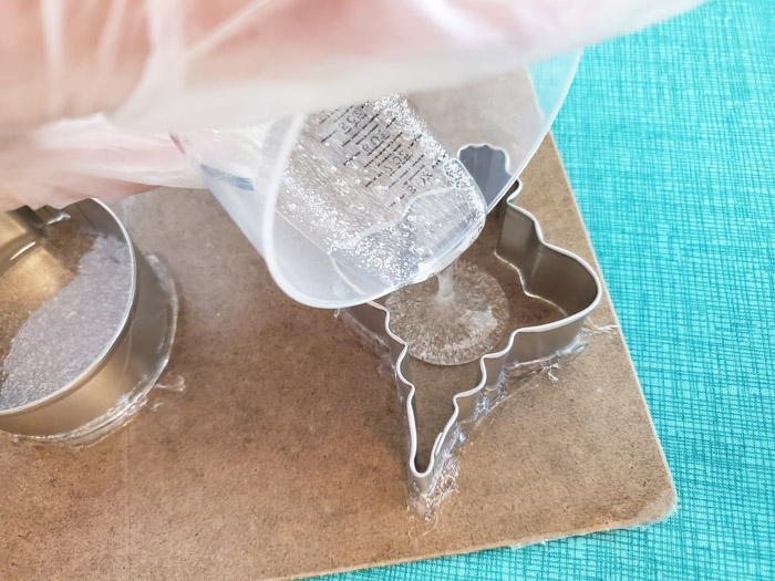 Pour resin into ornaments