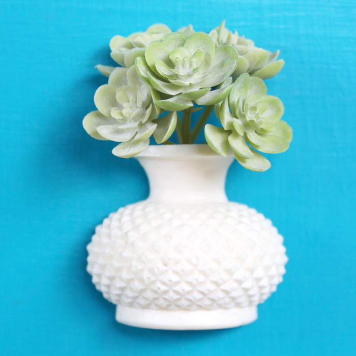 Make a cute succulent vase magnet with FastCast resin, a little faux succulent and a disc magnet, perfect for a fridge or locker ornament.