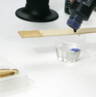 wood resin pendant - adding transparent blue pigment dye