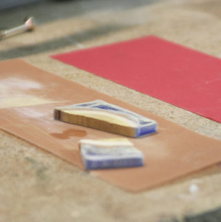 wood resin pendant - sanding with fine sandpaper