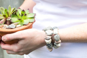 Learn how to make faux stone jewelry using modelling clay and items from your kitchen. A fun and earthy DIY accessory idea.