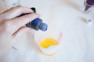 Adding Universal Transparent Dye to Fast Cast Resin to create a marbled effect.
