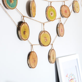 Lovely woodland nursery decor idea! Wood slices with woodland creature images and coated with resin. Step-by-step tutorial is included!