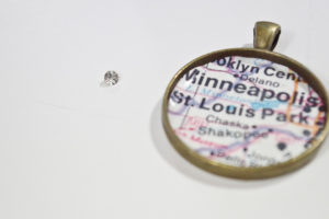 Resin Map Pendant - small jewel to mark home