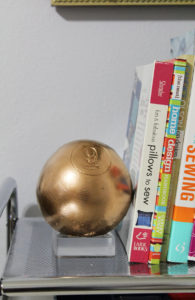acrylic bookend | lucite bookend | acrylic DIY | lucite DIY | bookend DIY | acrylic home accessories | acrylic home decor | clear home decor | lucite home accessories | lucite home decor | resin home decor | resin decor | lucite decor | acrylic decor | silicone rubber | make a mold | clear resin | Using an Oversized Wood Pool Ball to Make a Lucite Inspired Bookend