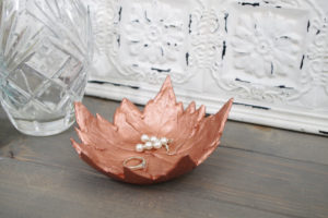 DIY Leaf Imprint Clay Bowls- multi leaf bowl holding jewelry sideview