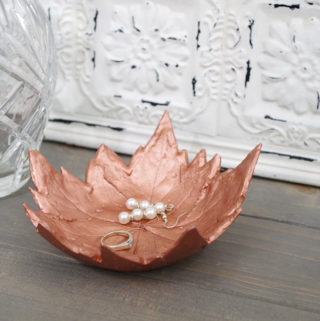 DIY Leaf Imprint Clay Bowls- multi leaf bowl holding jewelry sideview
