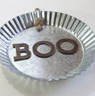 resin Halloween decorations - Boo metal tin - tape letters into place inside tin