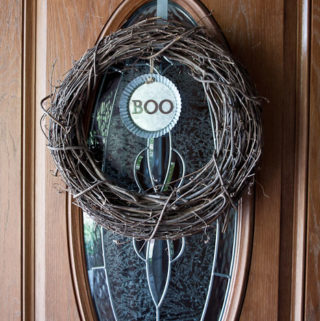 resin Halloween decorations - Boo metal tin - finished and added to wreath