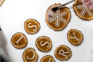 Resin Coated Merry Christmas Wood Slice Garland - use acid brush to coat entire top with resin