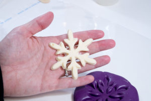 Snowflake mold and castings- the fully cured snowflake in natural color of fastcast