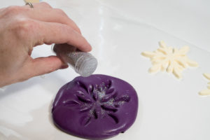 Snowflake mold and castings- sprinkle glitter over the mold