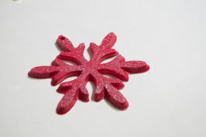 Snowflake mold and castings - red fastcast snowflake with glitter