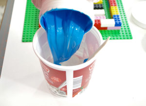 DIY Lego Mold using silicone rubber - pour part B into same container and mix thoroughly