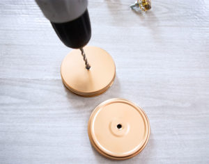 Drill holes in your jar lids