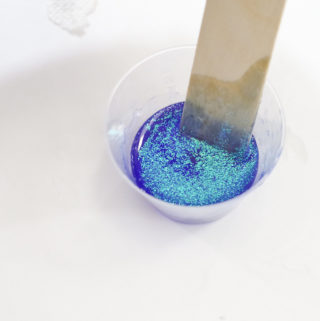 Resin Glitter Rings - glitter in blue resin stir thoroughly