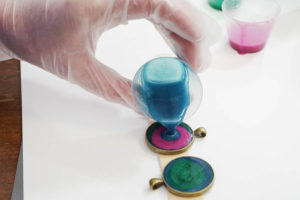 Sparkling Dripped Resin Pendants - add metallic paint to resin - pour third color into each bezel