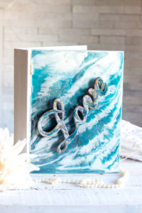 Wooden book box embellished with a poured resin cover