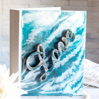 Wooden book box embellished with a poured resin cover