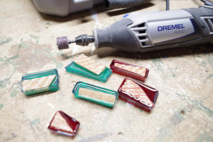 DIY Wood and Resin Necklaces - use Dremel to sand and shape each pendant