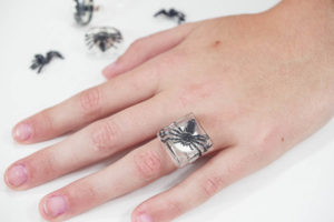 DIY Spider Resin Rings - finished square on hand