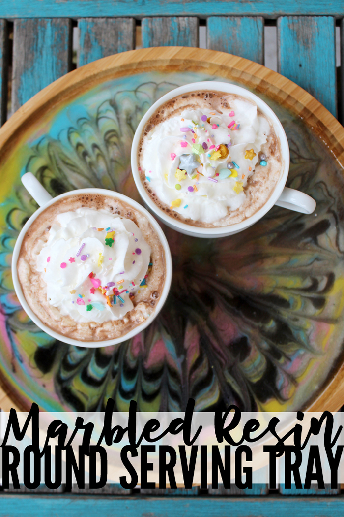 Marbled Resin Round Serving Tray DIY!  This uniquely colorful marbled resin tray is perfect for serving up warm cocoa on a cold day.  via @resincraftsblog