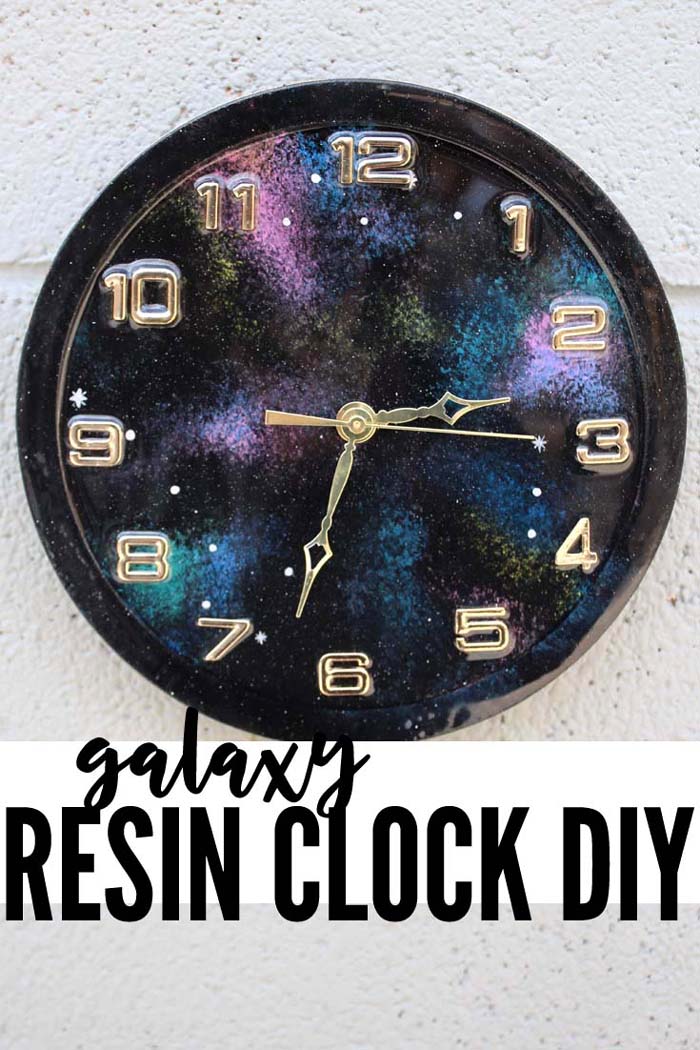 Ring in the New Year with a resin galaxy clock DIY that is out of this world!  Simple DIY with Envirotex high gloss resin.  #resincrafts #resincraftsblog #doodlecraft via @resincraftsblog