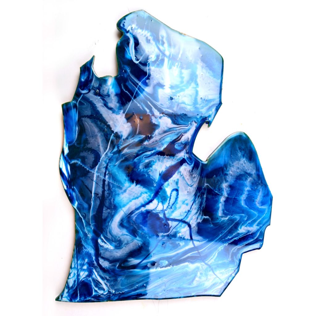 Resin art in the shape of a state coated with blue marbled resin.