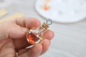 adding a cork to a necklace