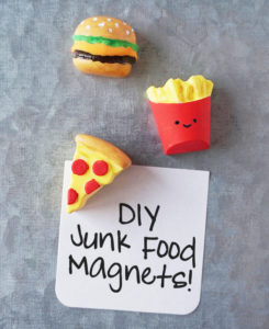 DIY Junk Food Magnets on metal holding a note