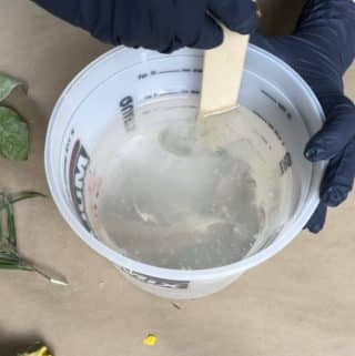 Promise-Deep-Pour-casting-resin-being-mixed-in-a-bucket