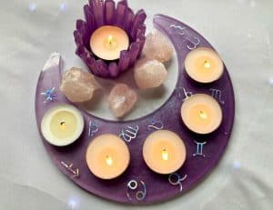 Purple moon resin tea light candle holder by @theresining on Instagram.
