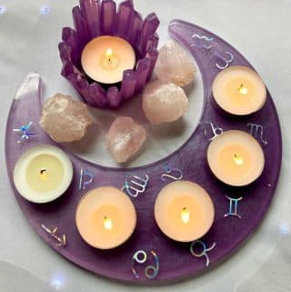 Purple moon resin tea light candle holder by @theresining on Instagram.
