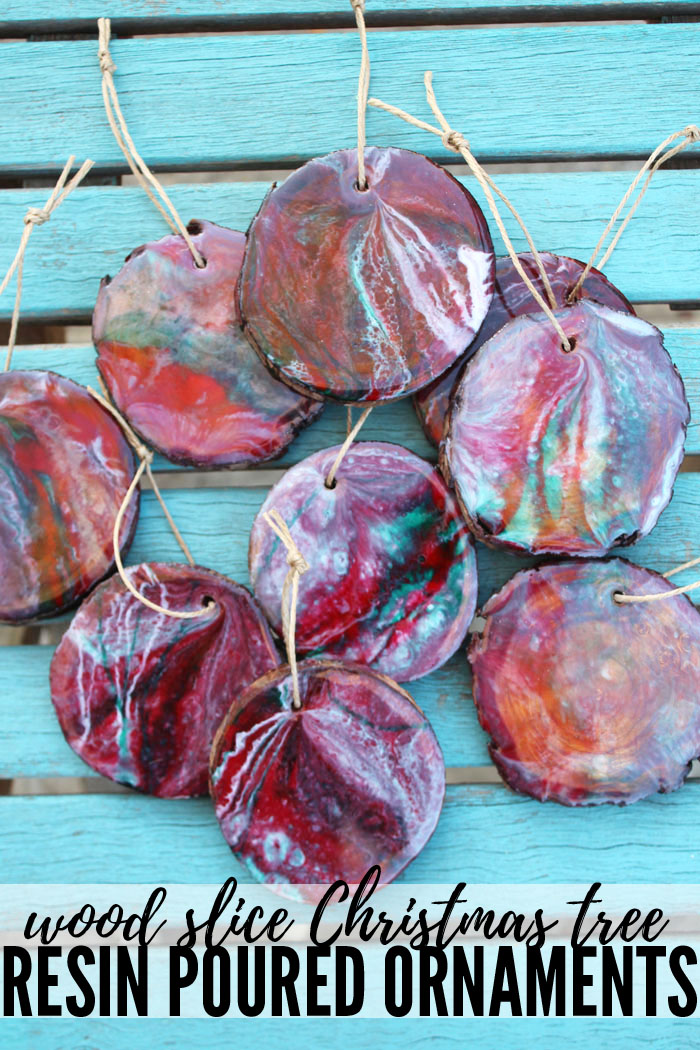 Make stunning wood slice ornaments using high gloss resin and the dirty pour technique. #resincrafts #resin #resincraftsblog via @resincraftsblog