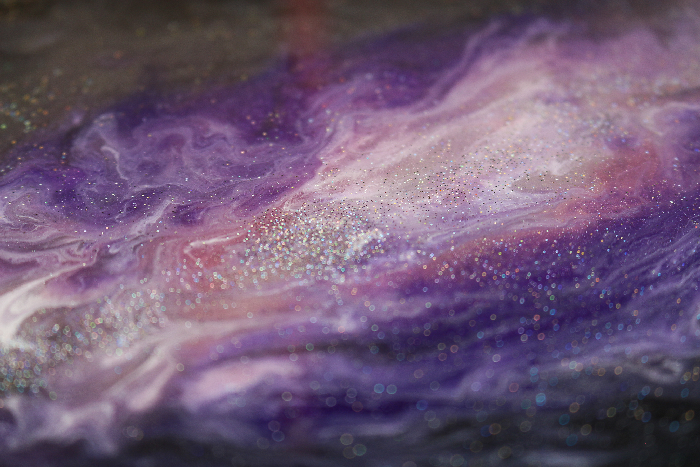 closeup of galaxy resin and glitter