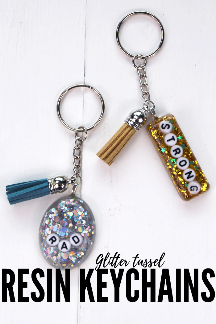 Learn to make glitter resin keychains with power words using EasyCast Resin, letter beads, tassels and keychain hardware. #resincrafts #resincraftsblog #resin via @resincraftsblog
