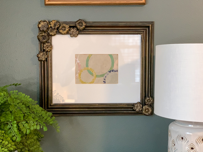 A plain picture frame got an upgrade with DIY resin embellishments made from FastCast resin.
