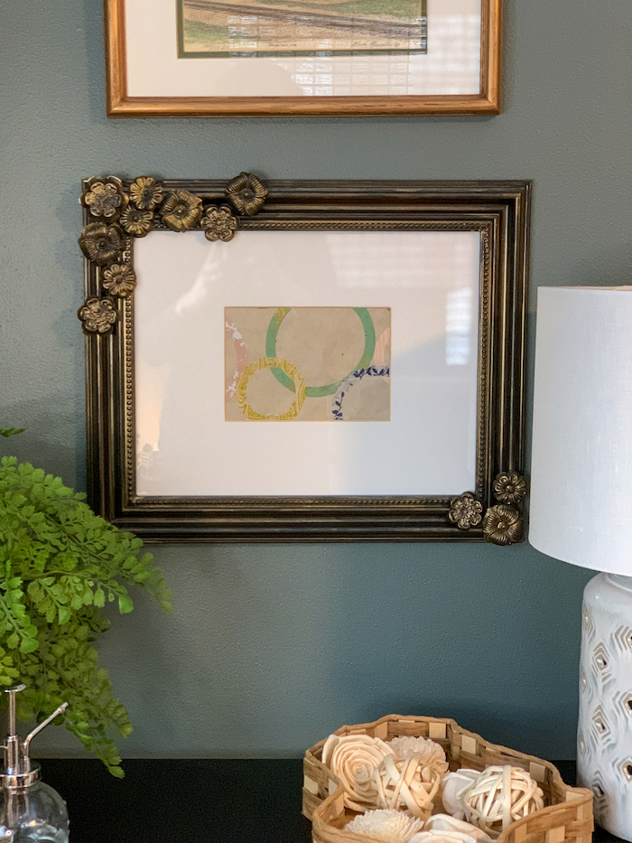 Upgrade a plain picture frame with DIY resin embellishments. We'll show you how to make resin embellishments in this post!