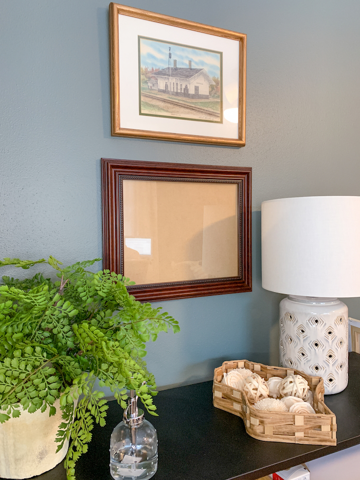 This plain picture frame got a makeover with DIY resin embellishments.