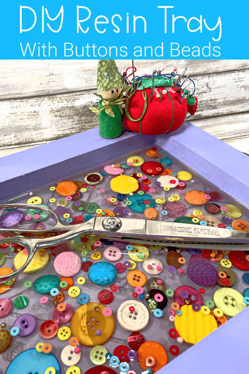 Create a beautiful decorative tray with resin and buttons via @resincraftsblog