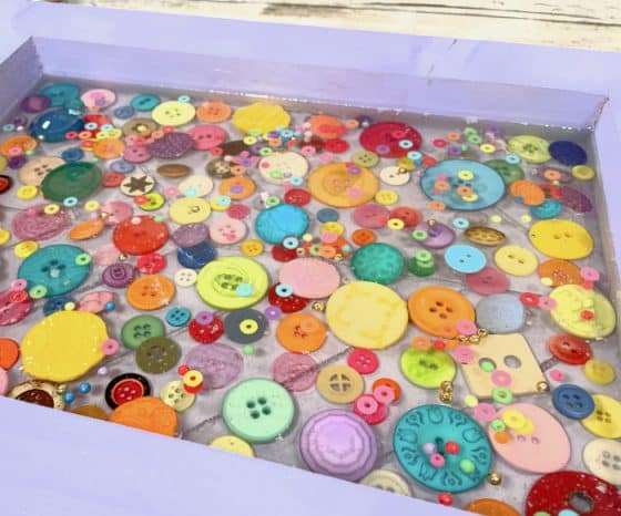Second Layer Resin in Tray with Buttons