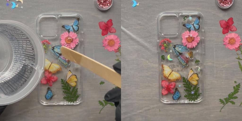 Resin being poured on top of stickers on a phone case.